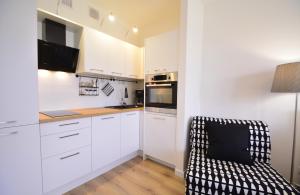 Kuchyňa alebo kuchynka v ubytovaní Apartamenty Bryza-Matejki 1B-Parking + 37 fotografií