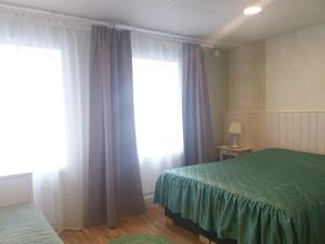 Postel nebo postele na pokoji v ubytování Nurmbergi Maja