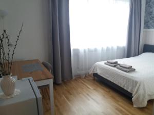 Postel nebo postele na pokoji v ubytování Nurmbergi Maja
