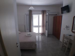 Postel nebo postele na pokoji v ubytování Harbour View - Oceanis Apartments