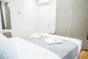 Postel nebo postele na pokoji v ubytování Α26 Premium flat near Monastiraki square in Athens