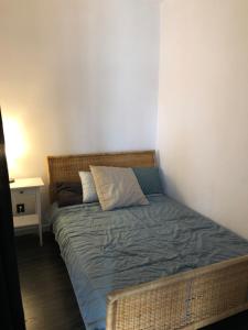 Posteľ alebo postele v izbe v ubytovaní Apartament Kościuszki