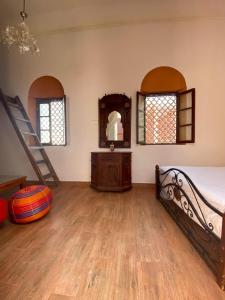 Letto o letti in una camera di Riad Jbara