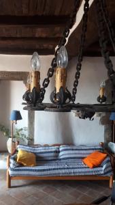 A bed or beds in a room at Residenza Monastero de' Medici