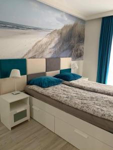 Posteľ alebo postele v izbe v ubytovaní Apartament Morski
