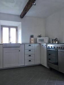 Kuchyňa alebo kuchynka v ubytovaní Rustic Home