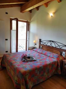 En eller flere senger på et rom på Villa Betulla con piscina privata sul lago di Como