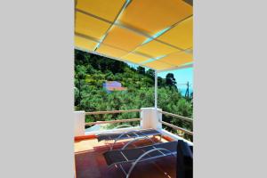 Балкон или терраса в Meltemi Appartment