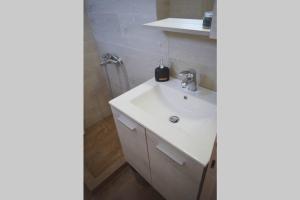 Ванная комната в Meltemi Appartment