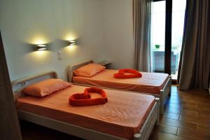 Кровать или кровати в номере Meltemi Appartment
