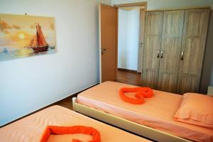 Кровать или кровати в номере Meltemi Appartment