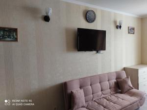 Uma TV ou centro de entretenimento em Apartment NATALIA in apart-otel RESIDENC