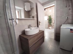 Koupelna v ubytování Apartments Bepi