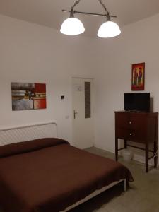 Postel nebo postele na pokoji v ubytování Villa Dietro la Luna