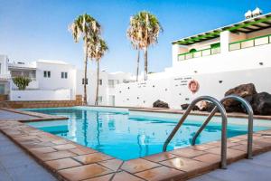 Bazén v ubytování Apartamento Aguaviva, tu lugar al lado del Océano nebo v jeho okolí