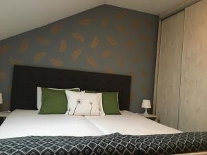 Posteľ alebo postele v izbe v ubytovaní Bóbita Apartman