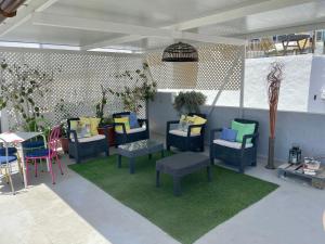 A seating area at Pensión Playa