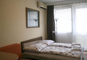 Posteľ alebo postele v izbe v ubytovaní Víctor Hugo Central Apartment