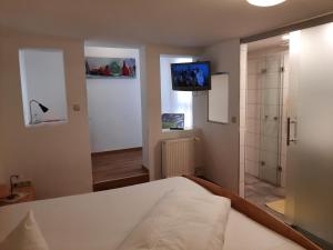 Postel nebo postele na pokoji v ubytování Gasthaus Gonnermann