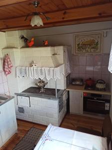 Kuchyň nebo kuchyňský kout v ubytování Agroturystyka Leśny Zakątek + 4 fotografie