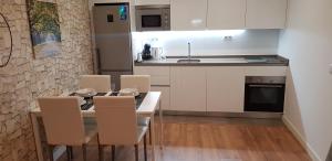 Kuchyňa alebo kuchynka v ubytovaní Apartamento EL CARMEN con Parking GRATIS