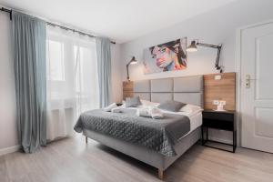 Posteľ alebo postele v izbe v ubytovaní Villa Bluemica