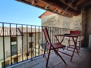 A balcony or terrace at Loft Apartamento Rural La Fresneda - Casa Vidal