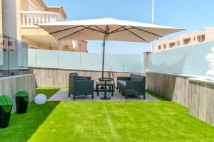 Patio lub wspólna przestrzeń na świeżym powietrzu w obiekcie Villa-Capricho Playa - Zeus