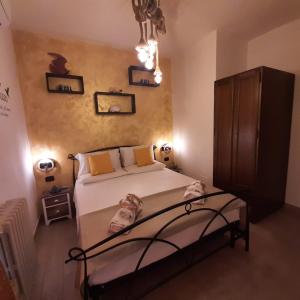 Łóżko lub łóżka w pokoju w obiekcie B&B Medusa House Gallipoli