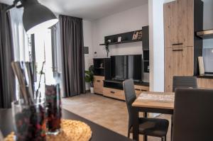 A television and/or entertainment centre at Borgo San Lorenzo Roma