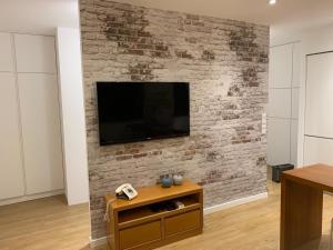 TV a/nebo společenská místnost v ubytování Palace House Apartment