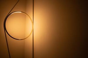 a mirror on a wall next to a wall at Regina Bianca - Camere, Suite & Spa - Sciacca in Sciacca