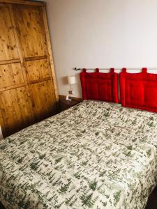 A bed or beds in a room at iRIVAS Lodge