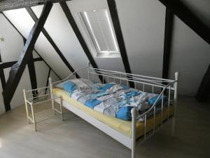 Tempat tidur dalam kamar di Am Backhaus