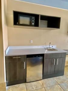 A kitchen or kitchenette at Texas Inn & Suites McAllen at La Plaza Mall and Airport