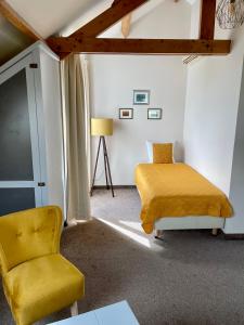 Postel nebo postele na pokoji v ubytování Havenhotel At Sea Texel