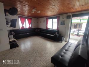 Posezení v ubytování Hospedaje Bolivar Alcala