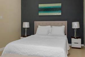 Letto o letti in una camera di A Wave From It All @ Aqueducts