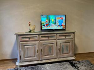 TV a/nebo společenská místnost v ubytování Antjes kleines Nest