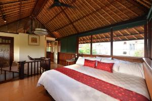 Postel nebo postele na pokoji v ubytování Bebek Cottages Sanur