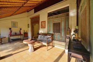 Posezení v ubytování Bebek Cottages Sanur