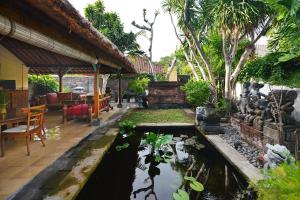Zahrada ubytování Bebek Cottages Sanur