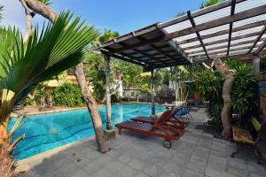 Bazén v ubytování Bebek Cottages Sanur nebo v jeho okolí