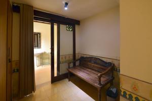 Postel nebo postele na pokoji v ubytování Bebek Cottages Sanur
