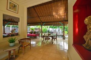 Posezení v ubytování Bebek Cottages Sanur