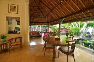Posezení v ubytování Bebek Cottages Sanur
