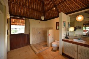 Koupelna v ubytování Bebek Cottages Sanur
