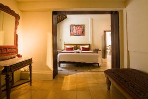 Postel nebo postele na pokoji v ubytování Bebek Cottages Sanur