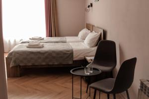 Posteľ alebo postele v izbe v ubytovaní Espresso