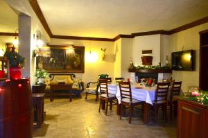 Area soggiorno di Ada Bacchus Hotel